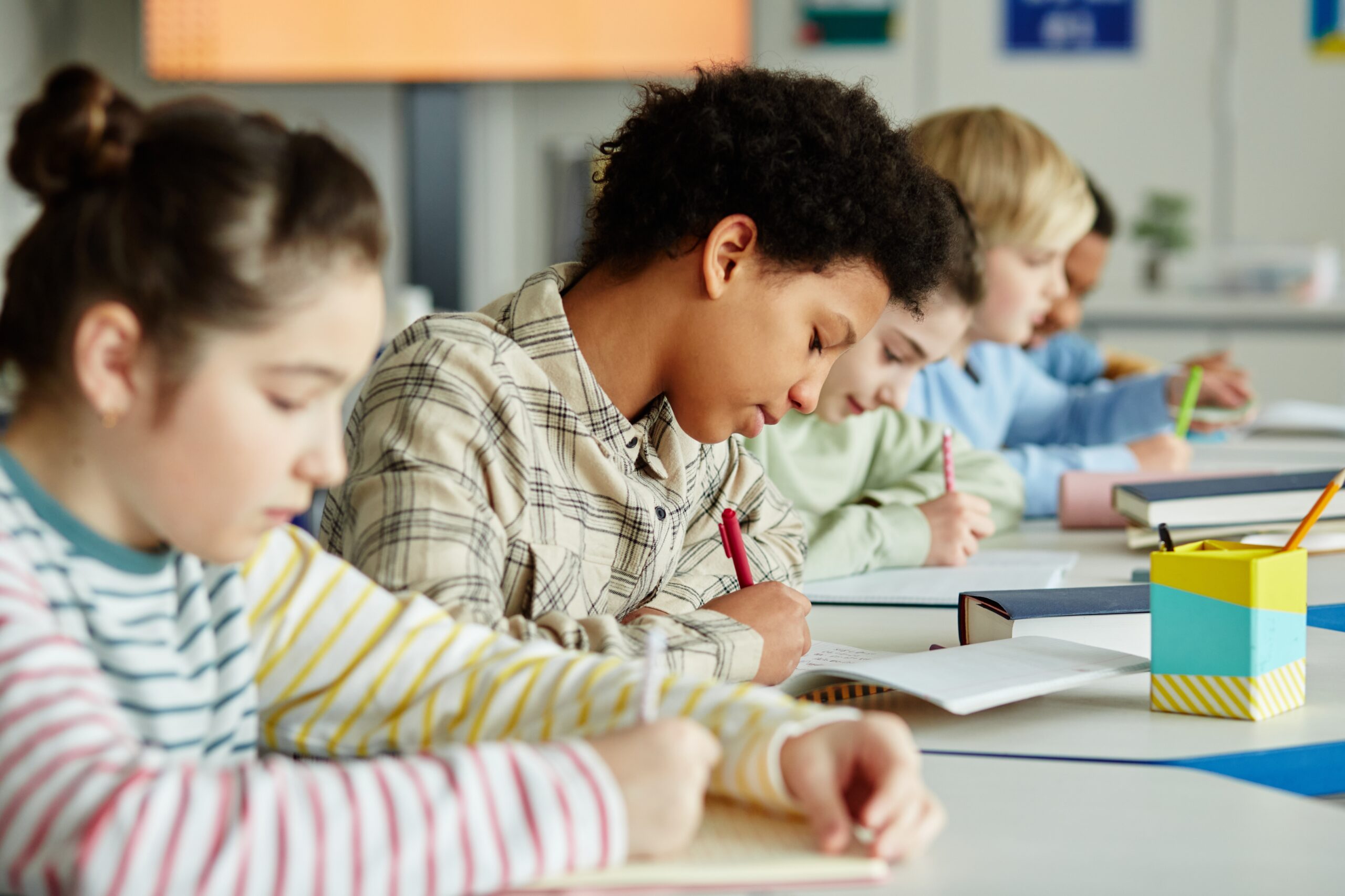 Side,View,Portrait,Of,Young,Black,Girl,Taking,Test,In